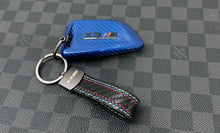 Load image into Gallery viewer, BMW Red & Blue Two-Tone Carbon Fiber Key Cover + Matching Keychain Set Premium Real Carbon For M3 M4 M5 M8 X3M X4M X5M X6M Competition Model