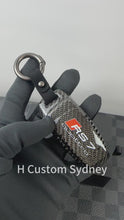 Load and play video in Gallery viewer, Premium Genuine Carbon Fiber Key Cover Keyring Package for Audi S7 RS7 S6 RS6 C8 Models Custom Made Exclusive Gift