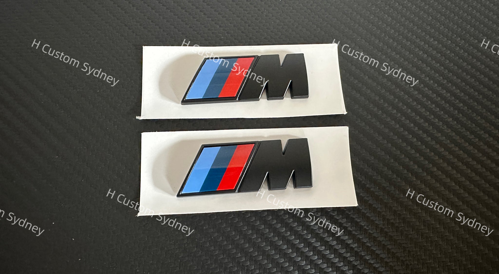 thumbnail image 2 of Genuine BMW Cerium Gray Fender Emblem  2 of 3