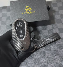 Load and play video in Gallery viewer, Premium Carbon Fiber Key Fob Cover Pack for Mercedes AMG GT55 C192 Exclusive Edition
