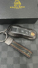 Load and play video in Gallery viewer, Luxury Carbon Fiber Key Case Keychain Set Fit For Porsche Taycan Exclusive Edition
