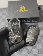 Load and play video in Gallery viewer, Premium Forged Carbon Fiber Key Fob Cover Case For Mercedes AMG New C E GLC S EQ Class W206 X254 W223 C236 W214 X290 Exclusive Made
