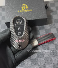 Load and play video in Gallery viewer, Premium Carbon Fiber Key Fob Cover Pack for Mercedes AMG E53 W214 Exclusive Edition
