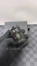 Load and play video in Gallery viewer, Luxury Forged Carbon Fiber Key Fob Cover Fit For Range Rover Sport Exclusive Edition Unique Gift
