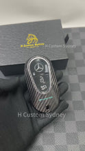 Load and play video in Gallery viewer, Premium Carbon Fiber Key Fob Cover Case For Mercedes AMG New C E GLC S EQ Class W206 X254 W223 C236 W214 X290 Exclusive Tiffany Blue Edition
