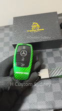 Load and play video in Gallery viewer, Luxury Carbon Fiber Key Cover Case For Mercedes AMG Model A C E CLA GLC GLE GLS Class Custom Made Limited Edition
