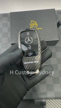 Load and play video in Gallery viewer, Luxury Genuine Carbon Fiber Key Cover Case For Mercedes AMG Model A C E CLA GLC GLE GLS Class Custom Made Limited Edition
