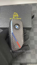 Load and play video in Gallery viewer, Premium Carbon Fiber Key Fob Cover Case Fit For BMW New X5 X6 X7 LCI M60i New Generation Key Exclusive Made
