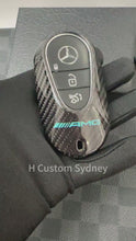 Load and play video in Gallery viewer, Luxury Carbon Fiber Key Fob Cover Case For Mercedes AMG New C E GLC S EQ Class W206 X254 W223 C236 W214 X290 F1 Petronas Edition Exclusive Made
