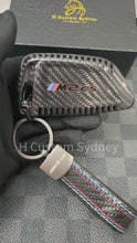 Load and play video in Gallery viewer, M2CS Genuine Carbon Fiber Keyring Key Fob Cover Pack For BMW New M2CS G87 2023-2026 Custom Made
