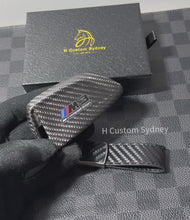 Load and play video in Gallery viewer, Genuine Carbon Fiber Keyring Key Fob Cover Keychain Pack For BMW M3 M4 M5 M8 Competition Custom Made Exclusive
