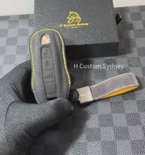 Load and play video in Gallery viewer, Luxury Alcantara and Nappa Leather Key Fob Cover Case Keychain Pack For Porsche Turbo S Model Custom Made Exclusive Gift
